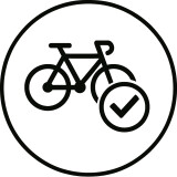 Schwarzes Fahrradsymbol mit Häkchen im Kreis, das die Fahrradfreigabe oder -zertifizierung symbolisiert.