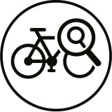 Schwarzes Fahrradsymbol mit Lupe in einem Kreis, das die Fahrradsuche darstellt.